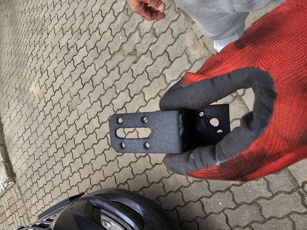 The finished S-shaped mounting flat bar.