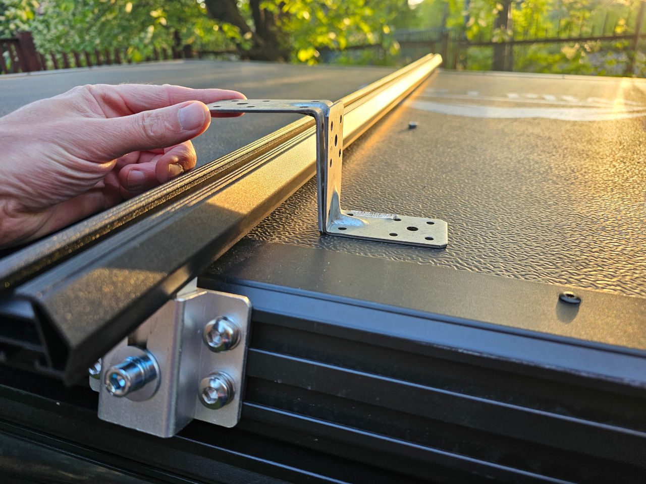 A sketch of the prototype bracket for mounting a solar panel on the rooftop tent.